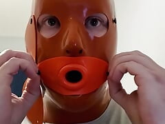 Sissy with Latex Hood Swallows Cum from Condom