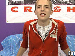 smirking young homosexual jerks off and shoots his fountain out