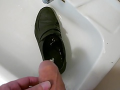 Piss in men's dress shoe