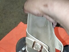 taken worn sandals from customer car garage