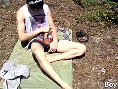 Wilderness inspires young twink to go nude and masturbate