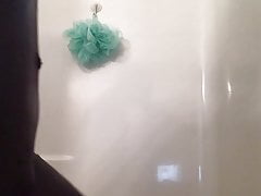 Wetting in fishscale shny catsuit