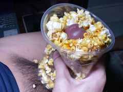 I fuck popcorn while watching a movie.