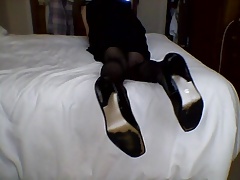 Transvestite cums in a condom