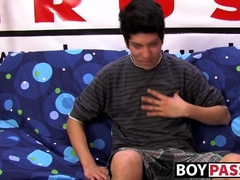 Interviewed young twink jerks off his big dick and cums