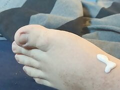 Rubbing Lotion on my Feet in Bed