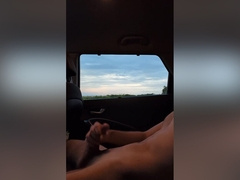 Jerking Off In The Car With Sunset As Trucks Go By