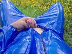 Jerk off and pee in a blue PVC suit