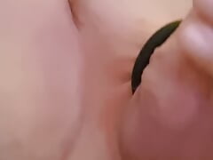 my husband lies and plays with his cock, meaning he rides a dildo