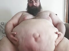 Belly play sitting on the couch