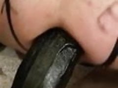 riding a black dildo