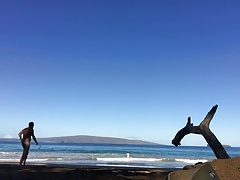 God walks into water at nude beach