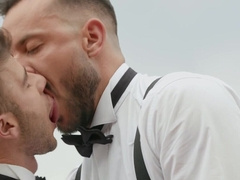 Horny men in suits pull out their dicks for a mutual moment in outdoor