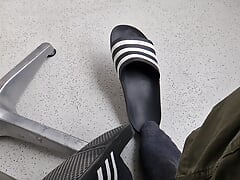 Addilettes with socks on the balcony 1
