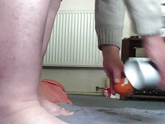 Creamy anal gaping with an orange
