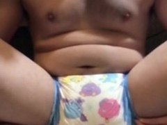 Despairingly emptying bladder piss in daytime nappy, prepping for a switch