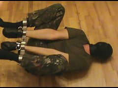 Rigidcuffed military slave