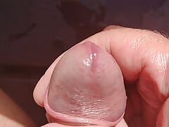 Playing wetly with my soft cock