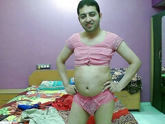 Cute pink princess sissy crossdresser femboy Sweet Lollipop in a top and pantie.