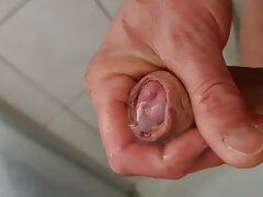 Close up uncut cock masturbation male squirting pee and creamy cumshot