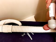 Hand Massager Vibrator Pressing A Small Penis On A Vacuum Cleaner Hose And Cumming On It