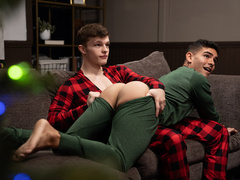 Skinny lovers fuck on the couch on Christmas eve