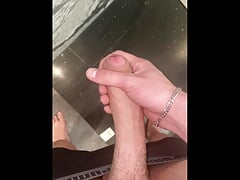 young man jerks his big cock until he gets weak and it all ends with a cumshot