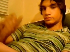 Hung lad films himself jerking off his massive gay cock