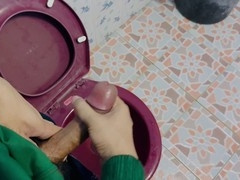 Amateur gay man jerks off in street food shop toilet