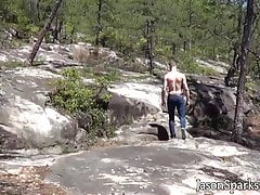 Jock jerks off solo while bathing in the soft warm sunlight