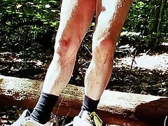 Wank outside on a log