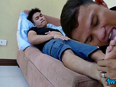 The odor of feet makes chinese twink stuff his face with dick