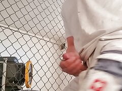 Worker jerks off with pierced cock in engine room