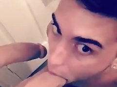 Andrew sucking on a large dildo