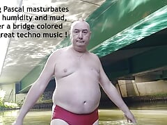 Fat pig Pascal masturbates in the humidity and mud under a bridge