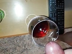 cumming in glas of redwine
