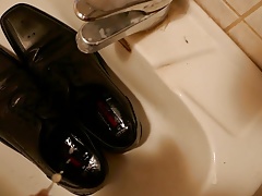 Piss in men's dress shoe