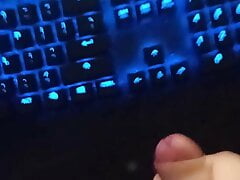 Man solo masturbating to a cumshot on keyboard