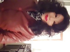 Female masking in leather coat