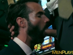 Handsome men in classy suits spitroasting pretty bottom