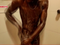 Hetero black dude taking a douche at his homo buddy's palace