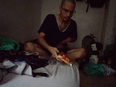 gainer gobbling a large slip of pizza