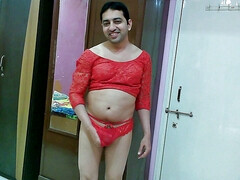 Cute sissy crossdresser femboy Sweet Lollipop in a crop top and pantie.