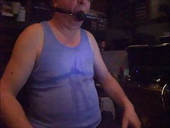 Slave Joe with stuffed mouth