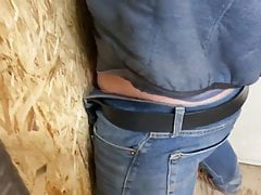 Two daddies use glory hole bottom