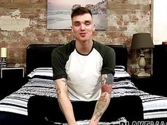 Dashing gay dude with tattoos tugs on his fat dick