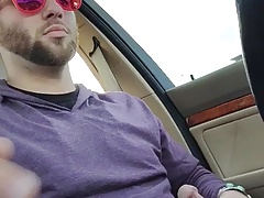 Cute guy jerking off while driving...