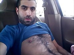 HAIRY MAN SHOOTS A LOAD IN HIS CAR