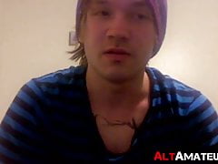 Tattooed punk dude jerking off his big throbbing cock solo