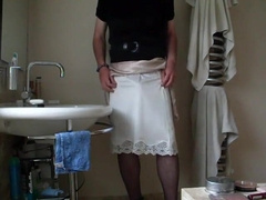 Demurely clad crossdresser stroking and spunking